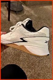 De Reebok Nano X3 schoen in wit bruin zwart