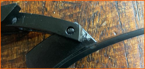 Open en sluit mechanisme van de Reeva buckle